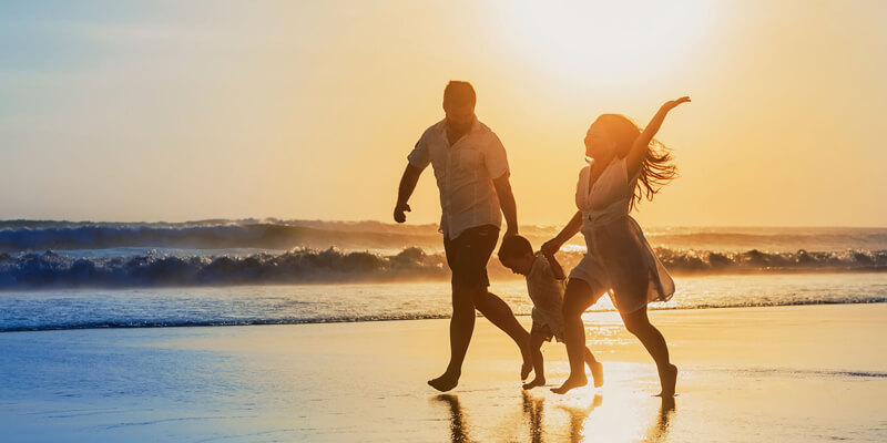 Happy campervan family on the beach in Ireland, Freedom
